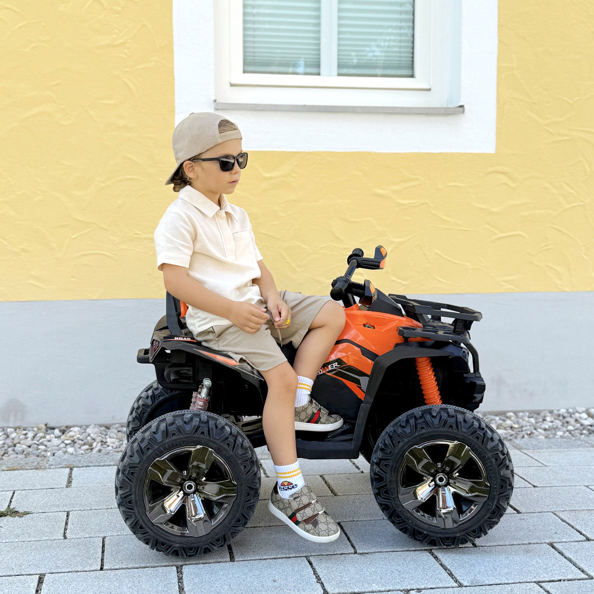 12V Kinderfahrzeug mit Vorwärts-, Rückwärtsfunktion, MP3-Musikplayer, Scheinwerfer, 3-8 km/h, 3-5 Jahre, Orange