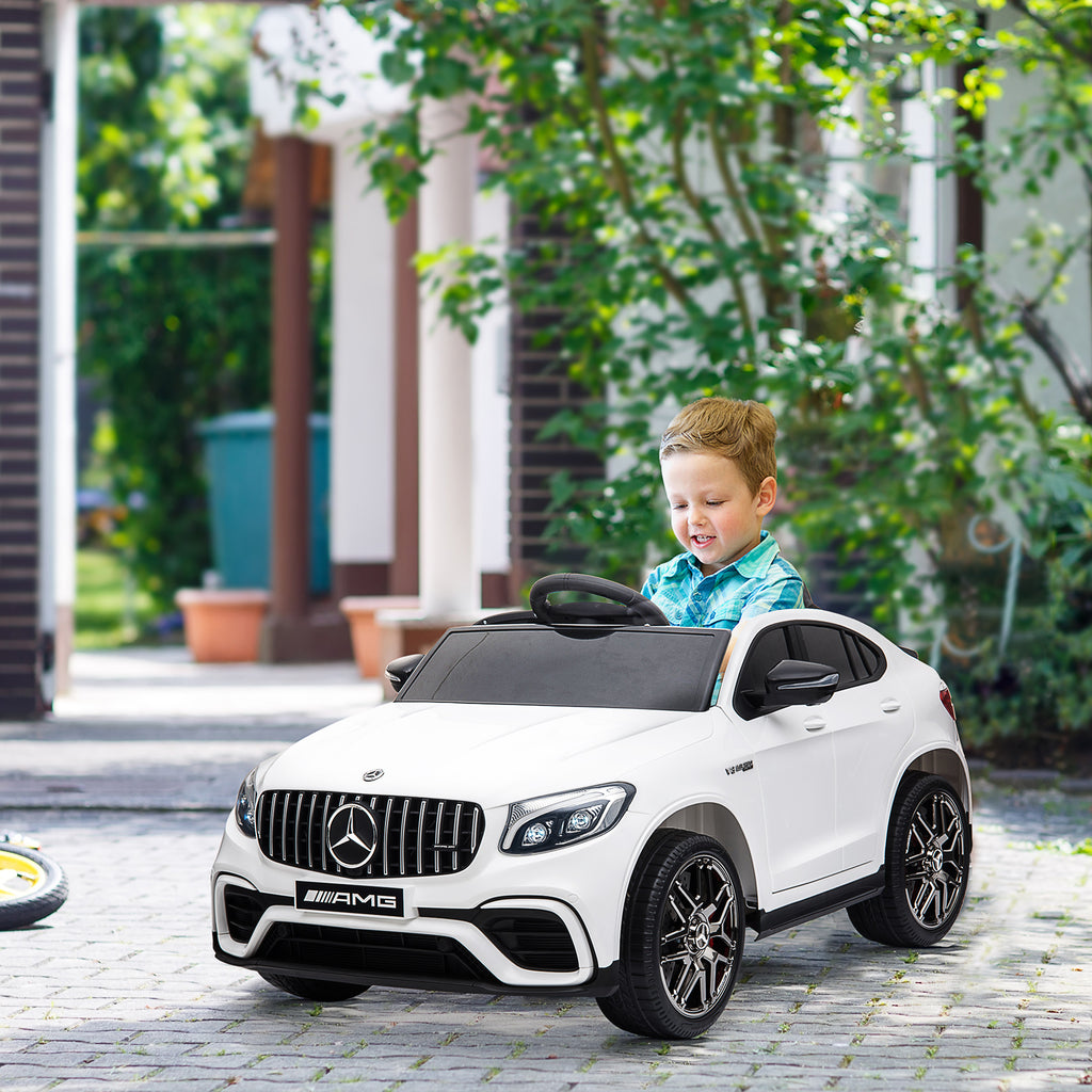 Kinder Elektroauto 12V Kinderauto mit 2,4 G Fernbedienung, 2 Motor, Kinderfahrzeug mit Hupe, Musik, Sicherheitsgurt, Elektrofahrzeug für 37-60 Monate Kinder, Weiß