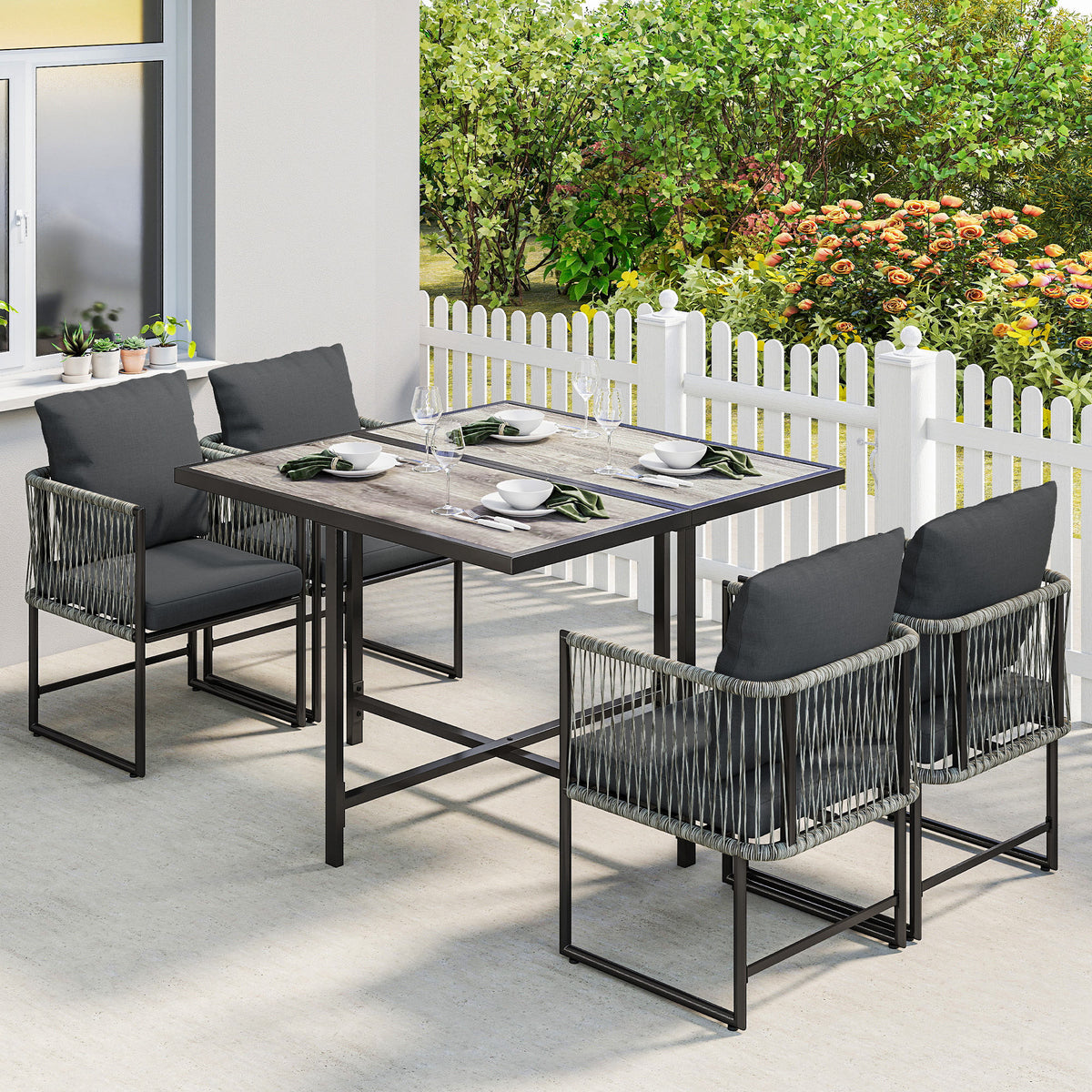 Polyrattan Gartenmöbel Set 5-teilig Platzsparend Sitzgruppe Tisch mit 4 Stühlen DPC-Tischplatte Kissen Grau